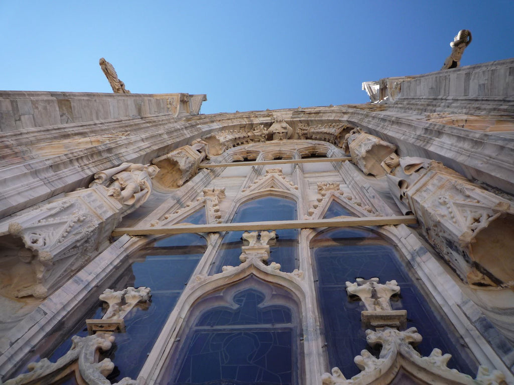 About “Gargoyles” on massive gothic architecture in the West.